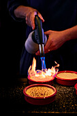 Caramelising crème brûlée with the flambé burner