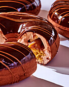 Donut eclairs with caramel filling