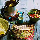 Vegan quesadillas with tomato and apricot filling