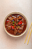 Asian beef stew with peppers and onions