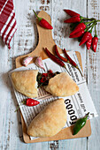 Calzone filled with rapini and chili peppers