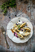 Sweet pasta pockets with blueberry filling