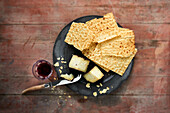 Pergamena di pane (Sardinian oven bread) with cheese and red wine