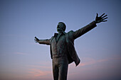 The Domenico Modugno statue at sunset.
