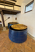 Wooden vats in the old brewery in the Convent of San Francisco, now a museum in Quito, Ecuador.