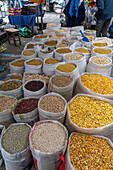 Bulk dry foods for sale in the open market in Otavalo, Ecuador.