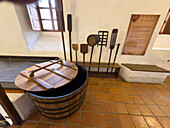 Wooden vats & implements in the old brewery in the Convent of San Francisco, now a museum in Quito, Ecuador.