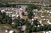 Aerial view of the Fort Bridger Rendezvous at the Fort Bridger Historic Site in Wyoming, a reenactment of the mountain man era. Prior permission granted for drone photography at site.