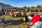 An outdoor Sunday church service in front of the Mormon Wall at the Fort Bridger Rendezvous in Wyoming.