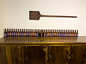 An antique wooden shovel in the old brewery in the Convent of San Francisco, now a museum in Quito, Ecuador. Used in brewing beer.