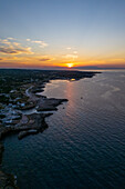 Aerial view of the sea and sunset in Polignano a Mare, Puglia, Italy