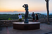 Sculpture of the Flamenco Dancer Carmen Amaya at sunset in Begur, Spain
