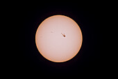 This is the disk of the Sun in normal white light showing the photosphere marked by a large sunspot group #4079, the largest of 2025 to this date on May 5, 2025. It was near the centre of the Sun's disk this day. The small sunspot #4076 is leaving the disk at right. Appearing on the disk since the previous photo I shot of the Sun on May 3 are sunspot groups #4081 (left of centre) and #4082 (coming onto the disk at left).