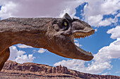 A life-sized replica of an allosaurus dinosaur at Moab Giants Dinosaur Park, Moab, Utah.