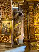 The spiral staircase to the choir in the Church of the Society of Jesus in Quito, Ecuador & the 17th Century painting of the prophet Obadiah by Nicolás de Goríbar, artist.