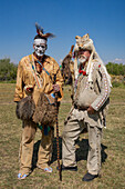 An Amerindian & a mountain man in period dress at the Fort Bridger Mountain Man Rendezvous in Wyoming.