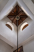 Looking up to the bell in the bell tower of the Iglesia Mitad del Mundo, Mitad del Mundo, Ecuador.