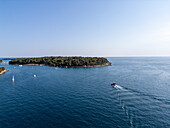 Aerial view of tranquil Brijuni Islands with beautiful boats in the clear Adriatic Sea, Pula, Istria, Croatia.