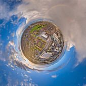 Aerial view of a tiny planet perspective of Hull city center with vibrant buildings and scenic clouds, England, United Kingdom.