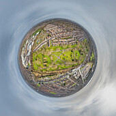 Aerial view of a tiny planet perspective of Hull with residential houses, green spaces, and roads, England, United Kingdom.