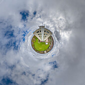 Aerial view of a tiny planet perspective of urban landscape with beautiful buildings and green fields, Hull, England, United Kingdom.