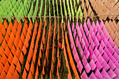 Araihazar, Bangladesh - 04 December 2020: Aerial view of colorful fabrics drying in rows at a vibrant dyeing workshop, Duptara, Araihazar, Dhaka, Bangladesh.