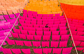 Araihazar, Bangladesh - 04 December 2020: Aerial view of vibrant fabrics dyeing in rows with workers engaged in the process, Duptara, Araihazar, Dhaka, Bangladesh.
