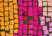 Aerial view of colorful fabrics dyeing workshop with workers and patterns, Duptara, Araihazar, Dhaka, Bangladesh.