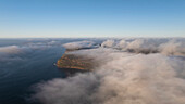 Aerial view of beautiful coastal landscape with clouds and ocean, Cape Peninsula National, Western Cape, South Africa.