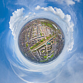 Aerial view of a tiny planet perspective of Hull city with beautiful buildings and scenic clouds, England, United Kingdom.