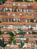 Aerial view of residential houses and charming rooftops in a picturesque neighborhood, Daberstedt, Thuringen, Germany.