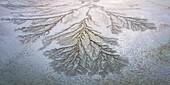 Aerial view of beautiful alluvial fan patterns in a scenic winter landscape, Cantil, California, United States.