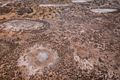 Aerial view of beautiful salt lakes with unique patterns and shapes in a barren landscape, Bowgada, Western Australia, Australia.