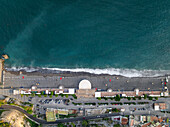 Aerial view of coastal town with beautiful beach and blue ocean, Vietri sul Mare, Campania, Italy.