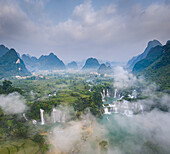 Aerial view of Ban Gioc Detian Falls along the Quay Son River on the Karst hills of Daxin County, Guangxi, China.