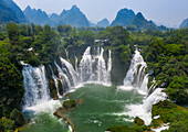 Aerial view of Ban Gioc Detian Falls along the Quay Son River on the Karst hills of Daxin County, Guangxi, China.