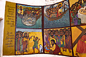 Kalacha, Kenya - 12 May 2022: View of vibrant religious murals depicting biblical scenes unfold in rich colors, telling stories of faith and tradition.