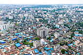 Chattogram, Bangladesh - 15 August 2025: Aerial view of a dense cityscape blending modern high-rises with traditional low-rise structures, creating a vibrant urban tapestry.