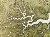 Aerial view of winding waterways carving through the earth, creating a sinuous dance of light and shadow across the landscape, Bay of Cádiz, Cádiz province, Andalusia, Spain.