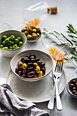 Olive branches, different coloured olives, amber wine