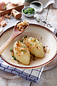 Cepelinai - Litauische Kartoffelknödel mit Fleischfüllung und Speck