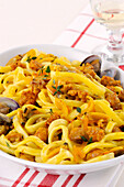 Fettuccine with sausage and mussels