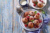 Bomboloni with raspberries and raspberry jam