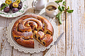Roll (coiled) cake with plums