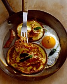 bacon blinis with fried egg