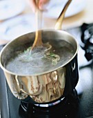 Chicken stock with egg strings