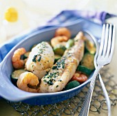 Monkfish fillets with shrimps and zucchinis