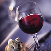 glass of red wine and Roquefort on bread