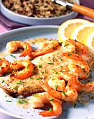 Oven-baked sole and prawns with butter