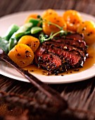 Ostrich steak with apricots
